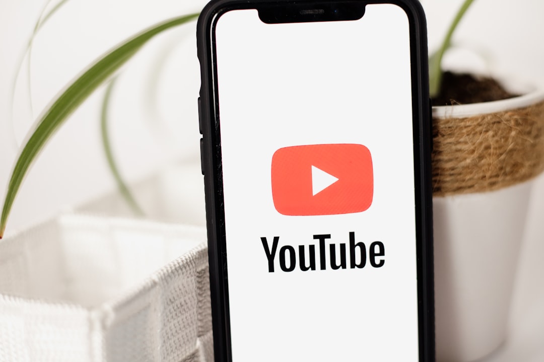 project-01-a a-cell-phone-with-a-youtube-logo-on-it-7inus-creoy